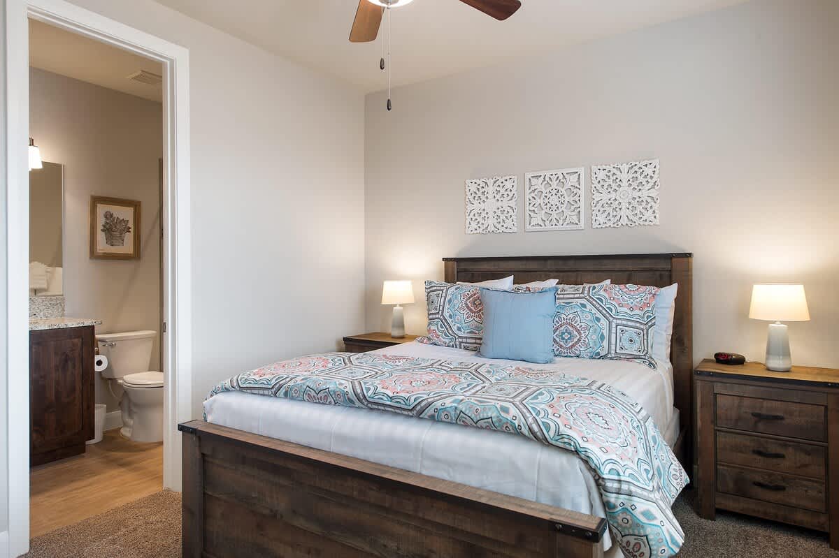 Master bedroom 3 upstairs with queen bed and bathroom