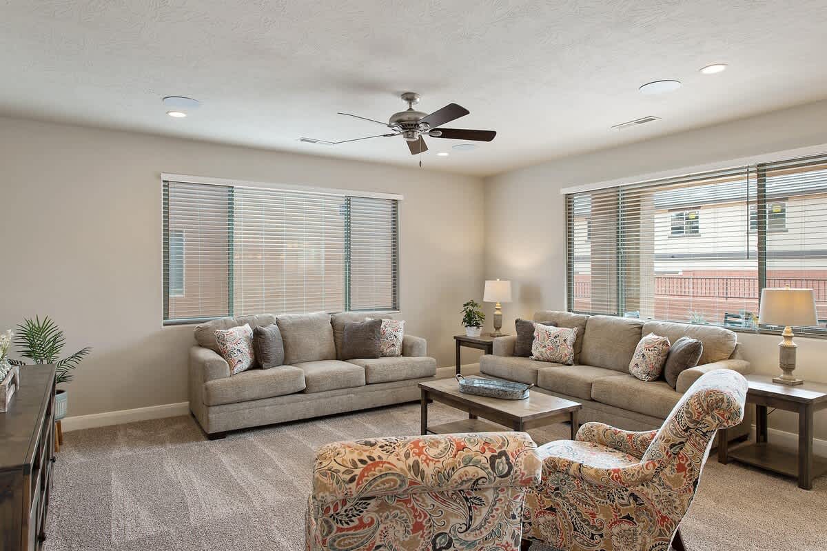 Comfortable family room with 2 sofas and chairs to relax