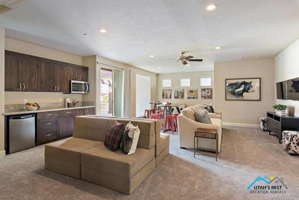 Expansive upstairs living room with TVs, Xbox One`s and games