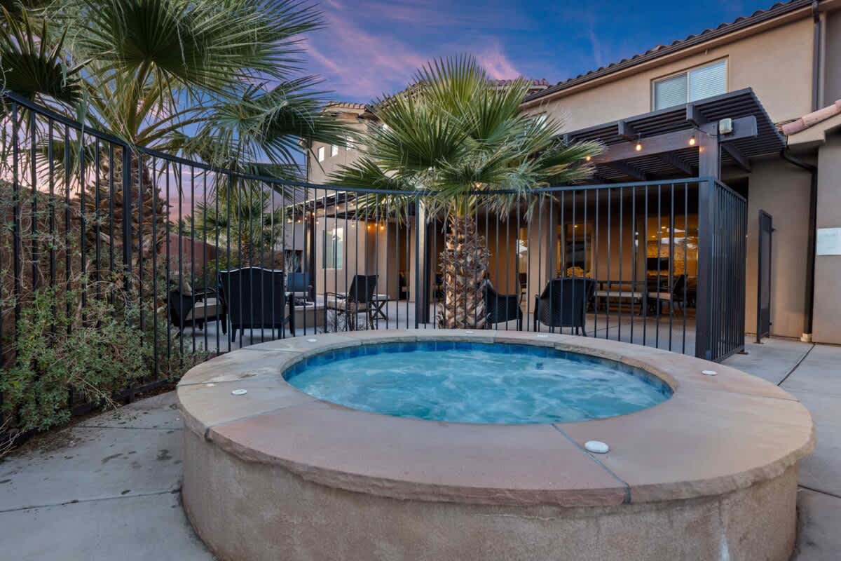 Private built-in hot tub next to the pool