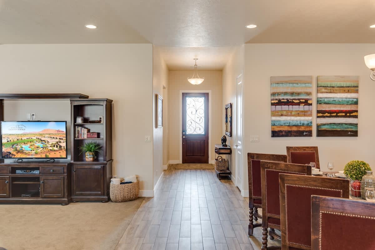 Entry opens to family room and dining areas