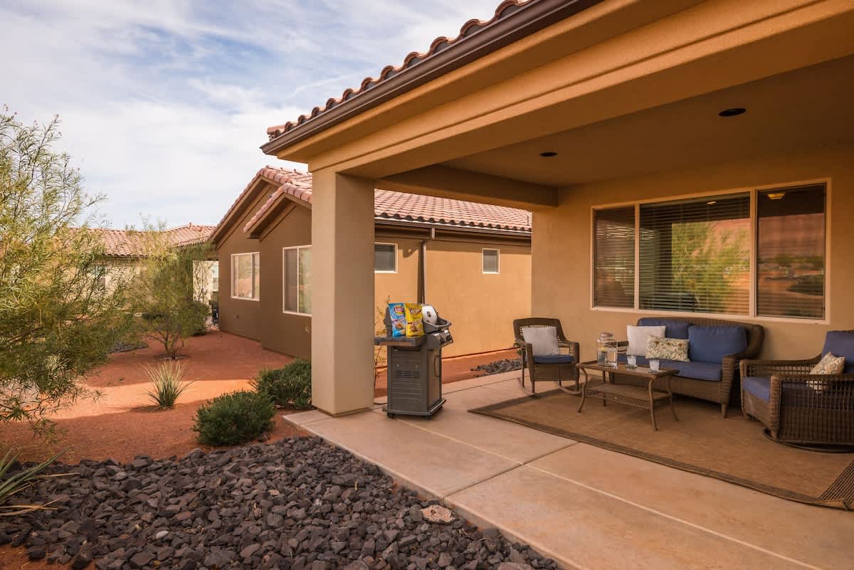Nice private covered patio with patio furniture and BBQ