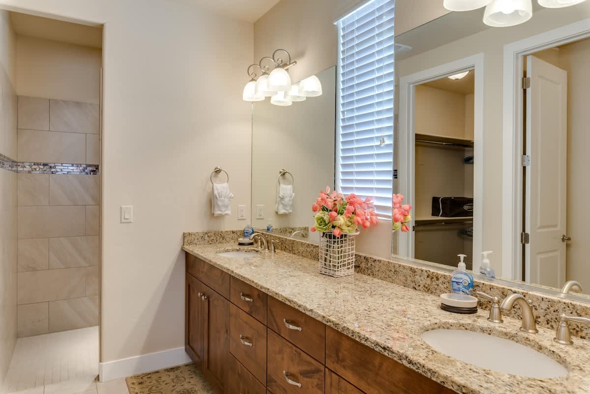 Large walk-in shower and double sink vanity
