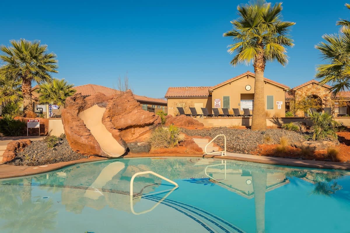 Lower pool with water fall and slide (short walk)