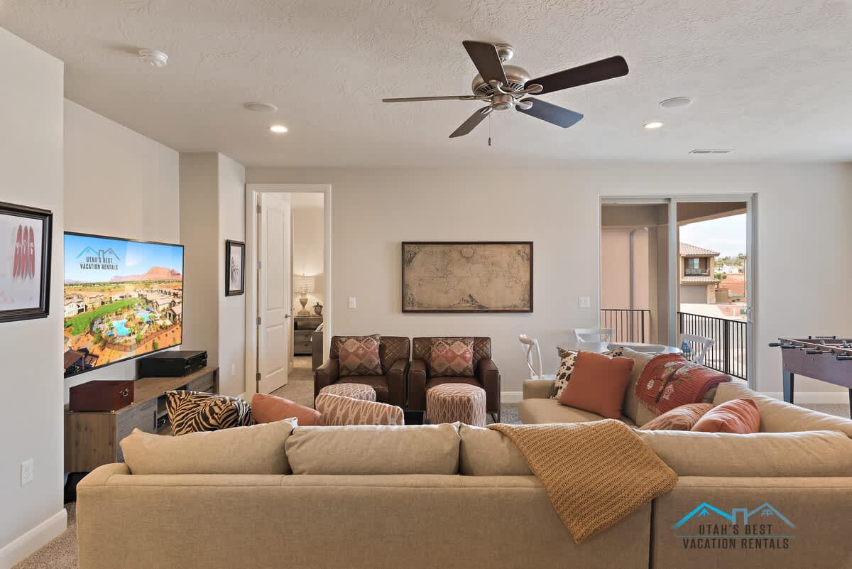 Upstairs living room with a 75 inch Ultra HDTV