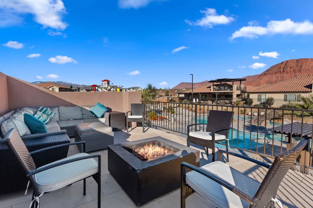 Balcony with comfy seating, overlooking water park