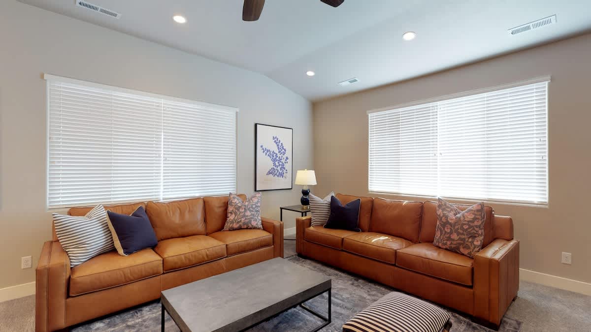 2 beautiful comfortable sofas in main family room off kitchen