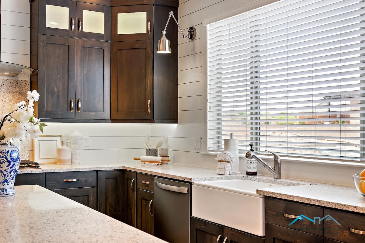 Modern kitchen with farm sink and island and everything needed