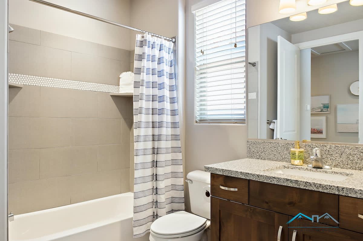 Bathroom for bunk room 1 with tub/shower combo