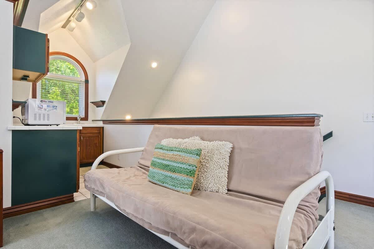 Full size fold-down futon in guest house for additional sleeping