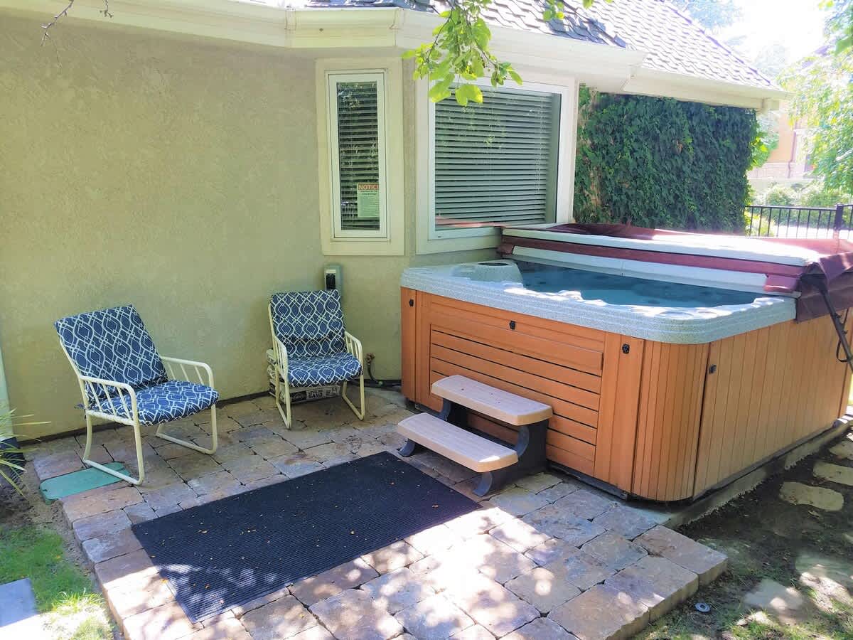Private hot tub in beautiful side yard