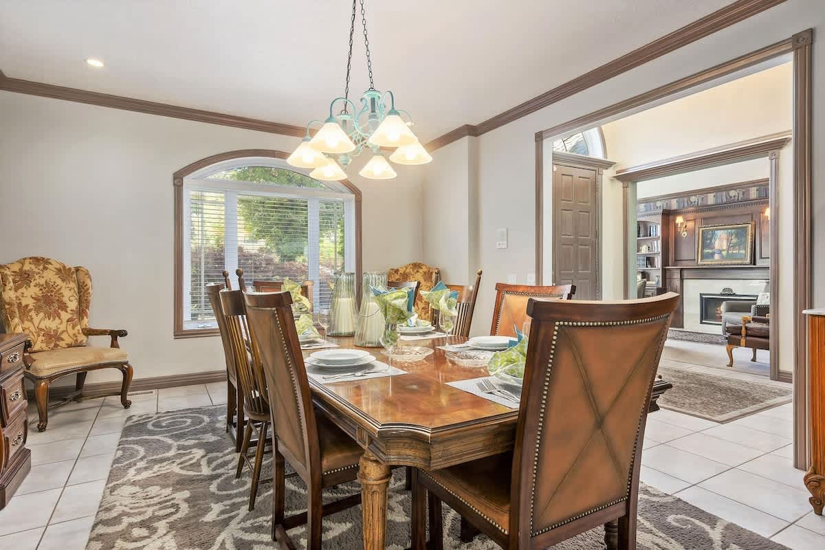 Gorgeous formal dining room with large dining table for up to 10