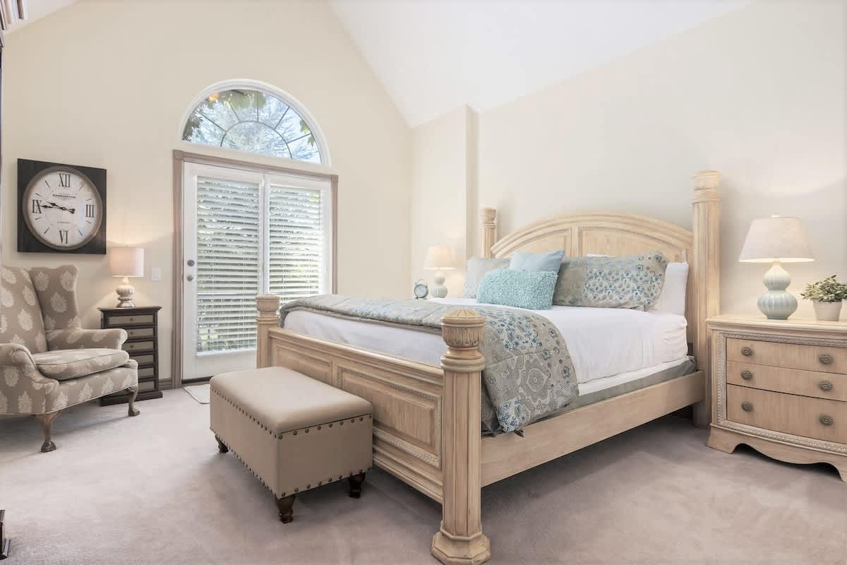 Jr. Master suite on 2nd level with king bed, balcony, bathroom