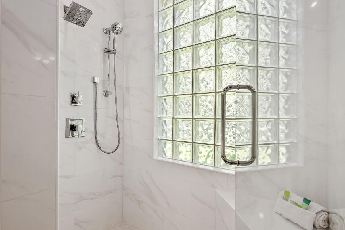 Master bathroom with newly added enlarged marble shower