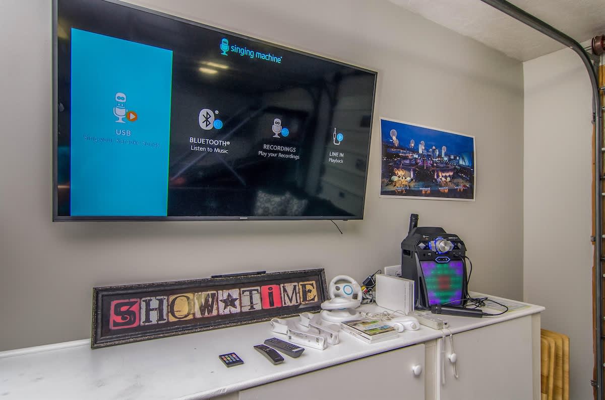 Game Room TV with XBox, karaoke, air hockey, darts