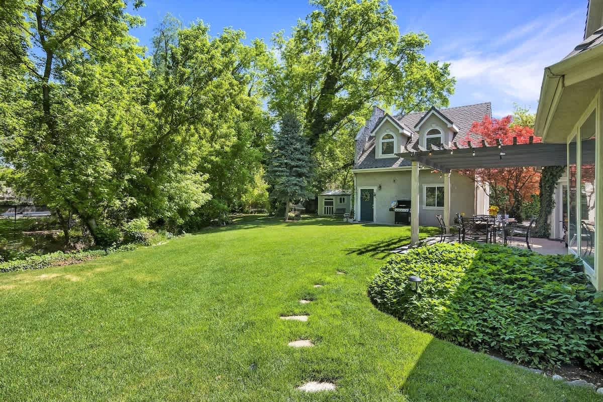 Gorgeous woodland grounds with stream and large mature trees