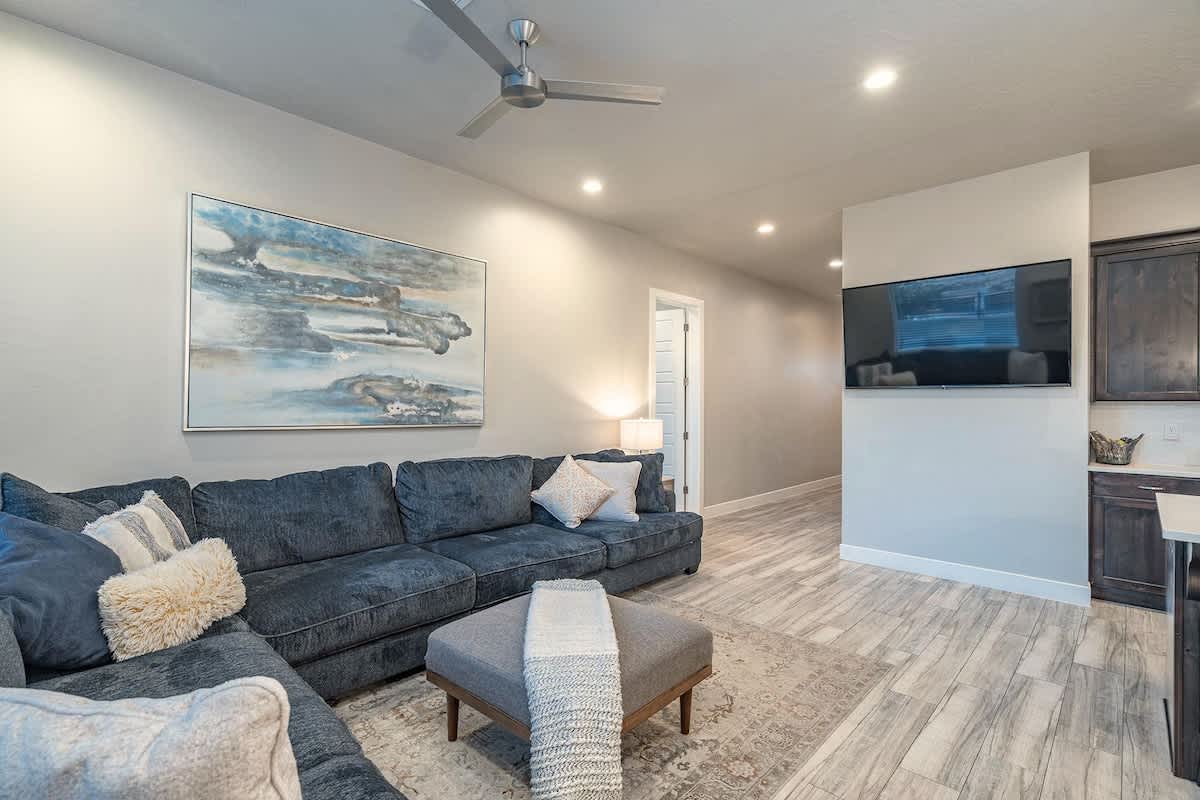 Spacious living room with TV