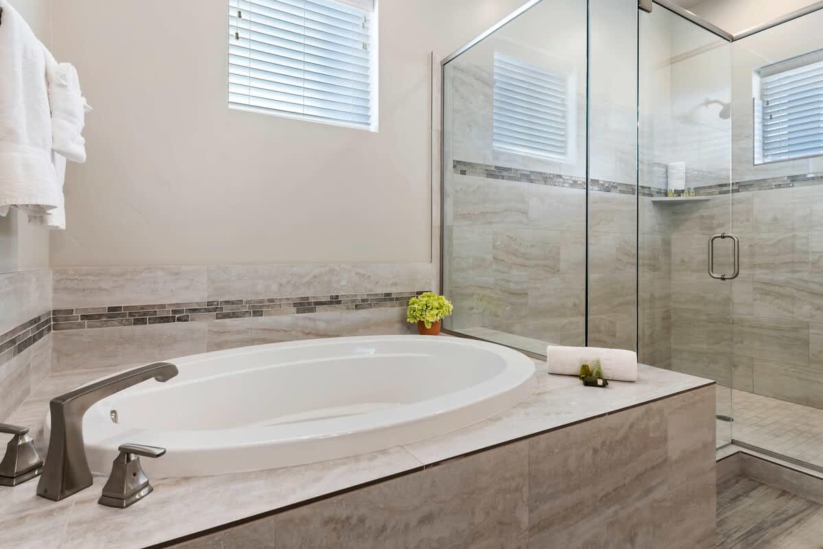 Master Bedroom with double sinks, large shower and tub