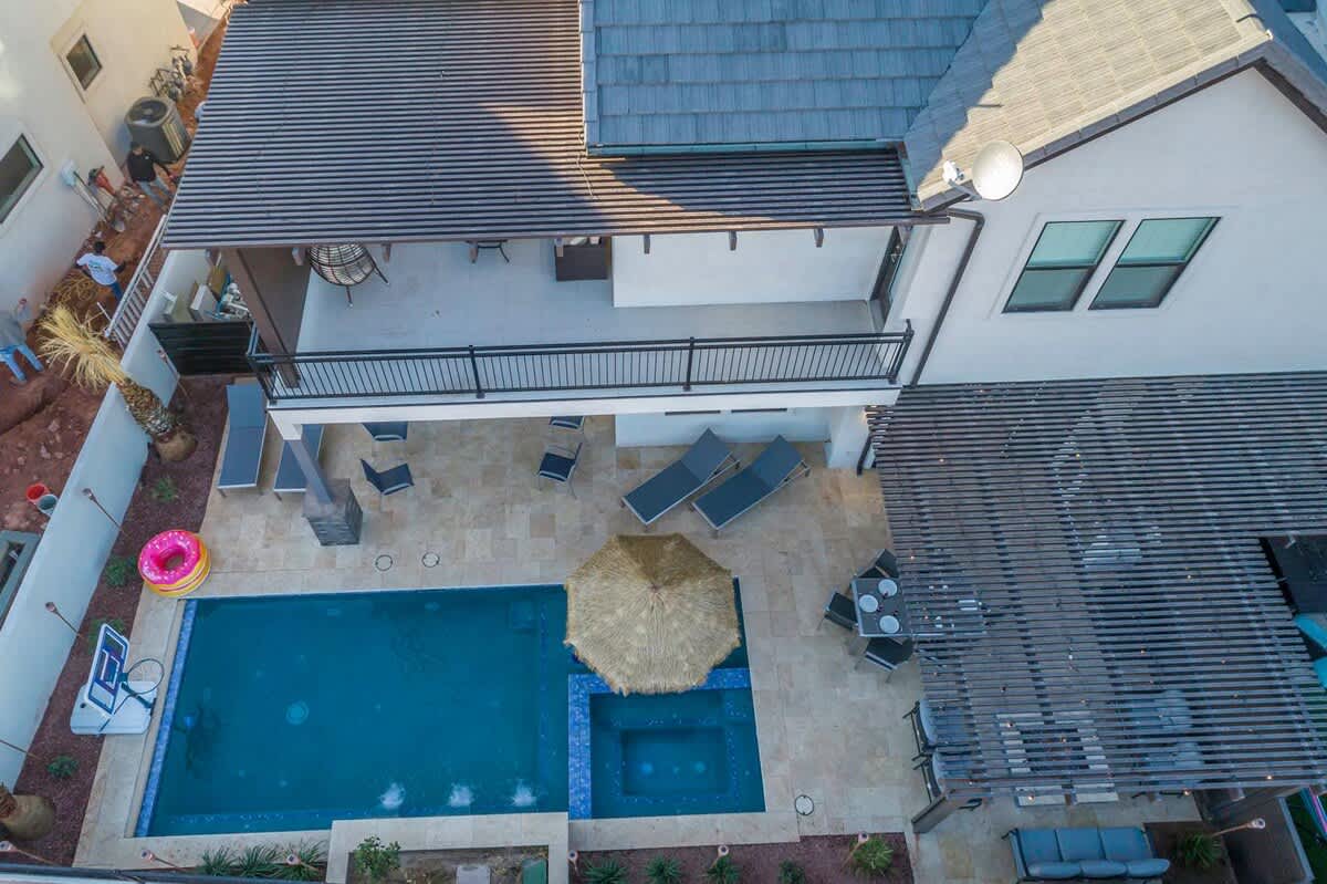 Aerial view of backyard oasis with private pool