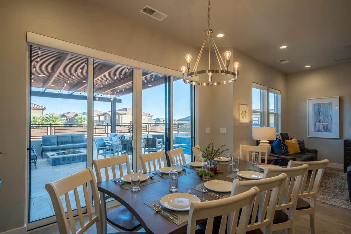 Dining area looking out to the pool area in back