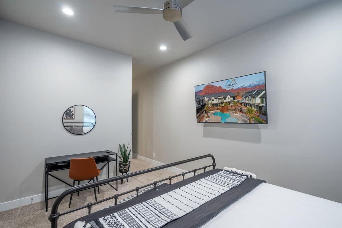 Bedroom 2 with king bed and large TV