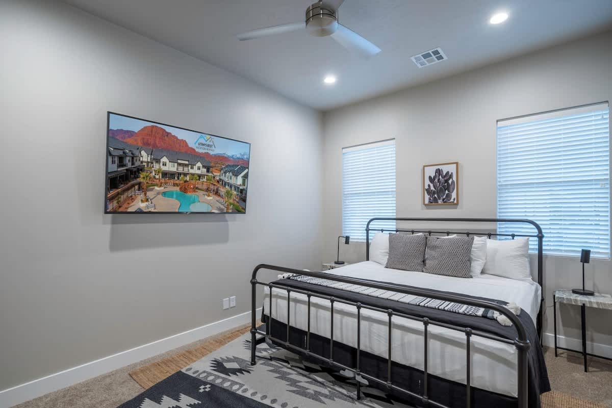 Bedroom 2 with king bed and large TV