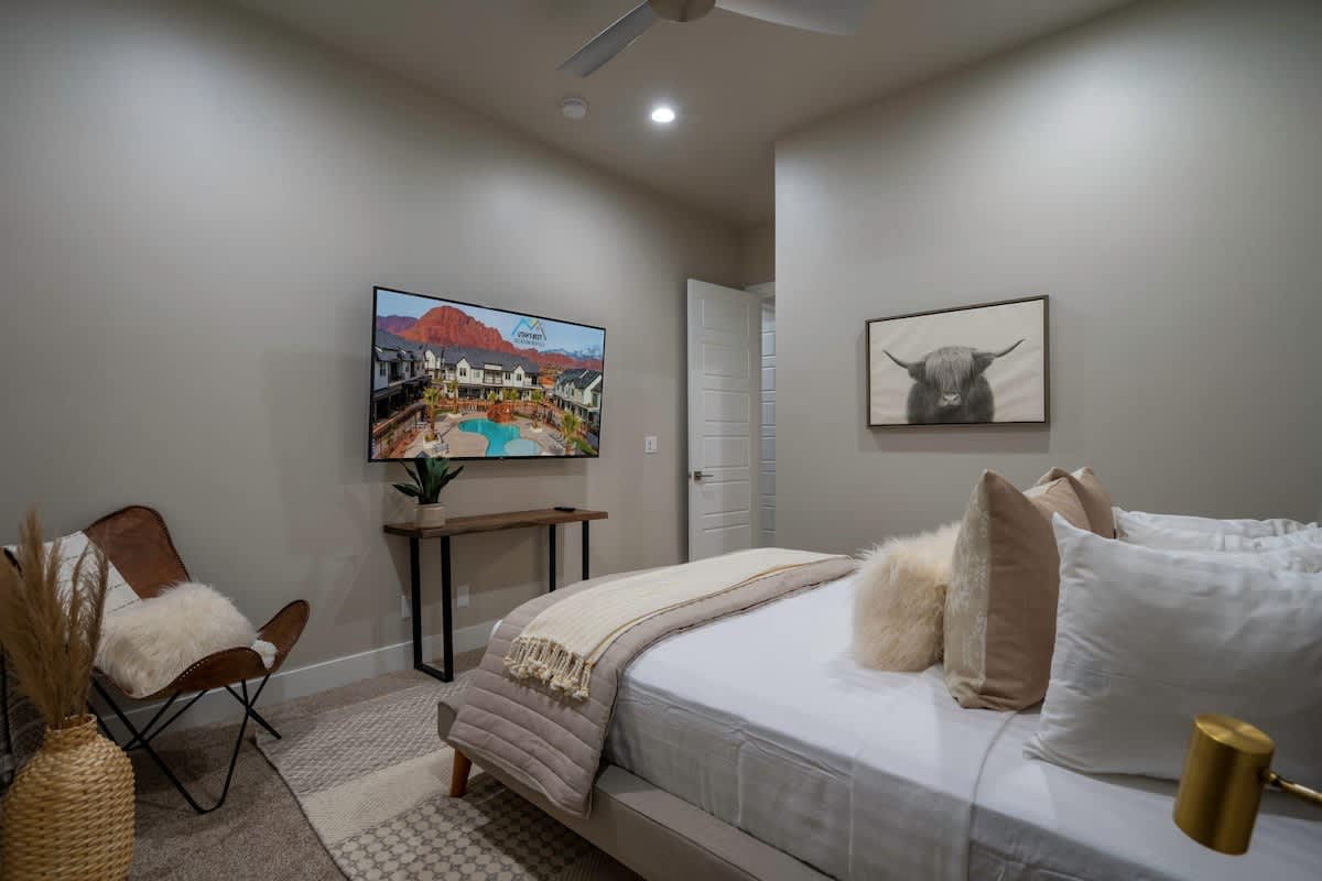 Bedroom 5 with king bed and large TV