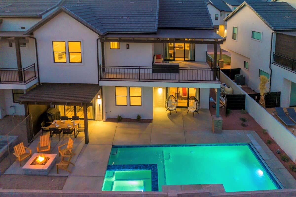 Oasis resort backyard with pool, hot tub, fire pit, 2 patios