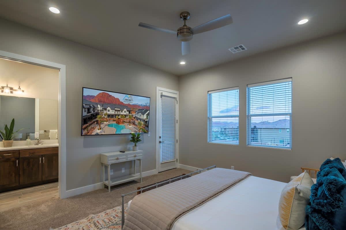 Bedroom 3 with king bed and large TV