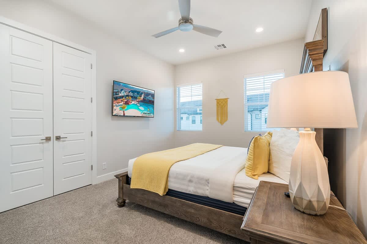 Bedroom 2 with king bed and TV