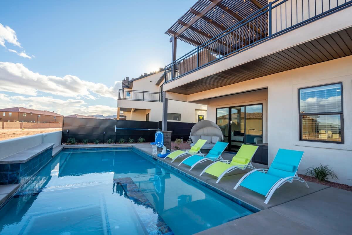 Beautiful private pool and hot tub with lounge chairs