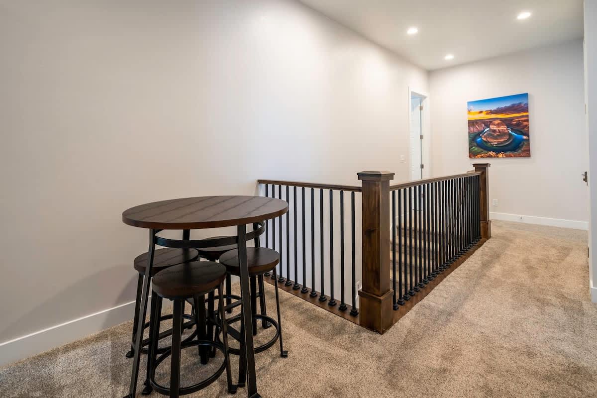 Upper floor nook with table and chairs