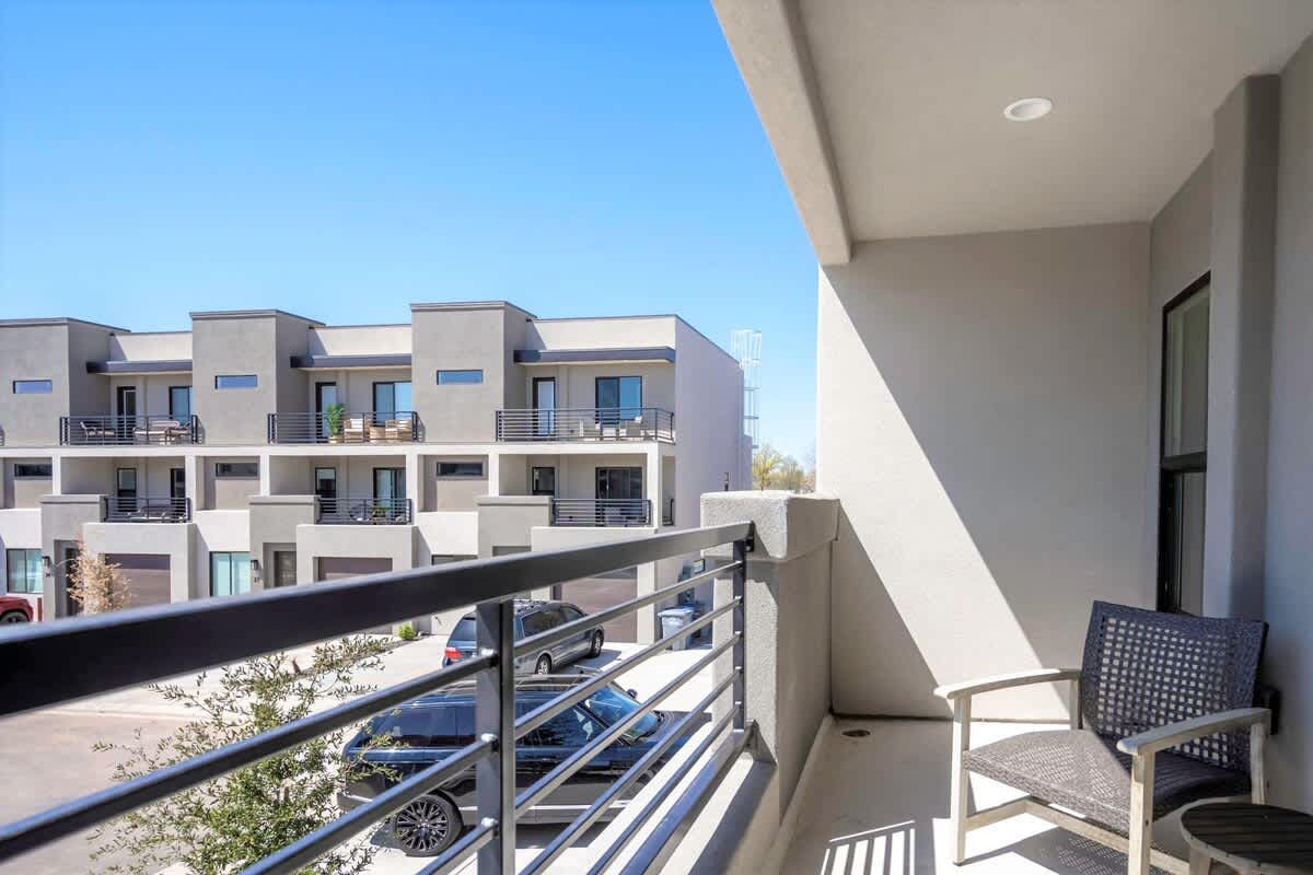 Covered balcony patio with seating