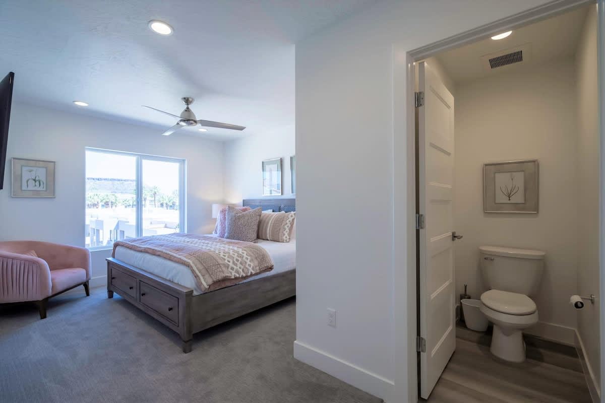 Master bedroom with king bed and bathroom on 2nd floor
