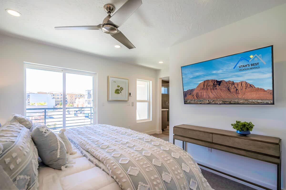 Bedroom 2 on 2nd floor with king bed and TV