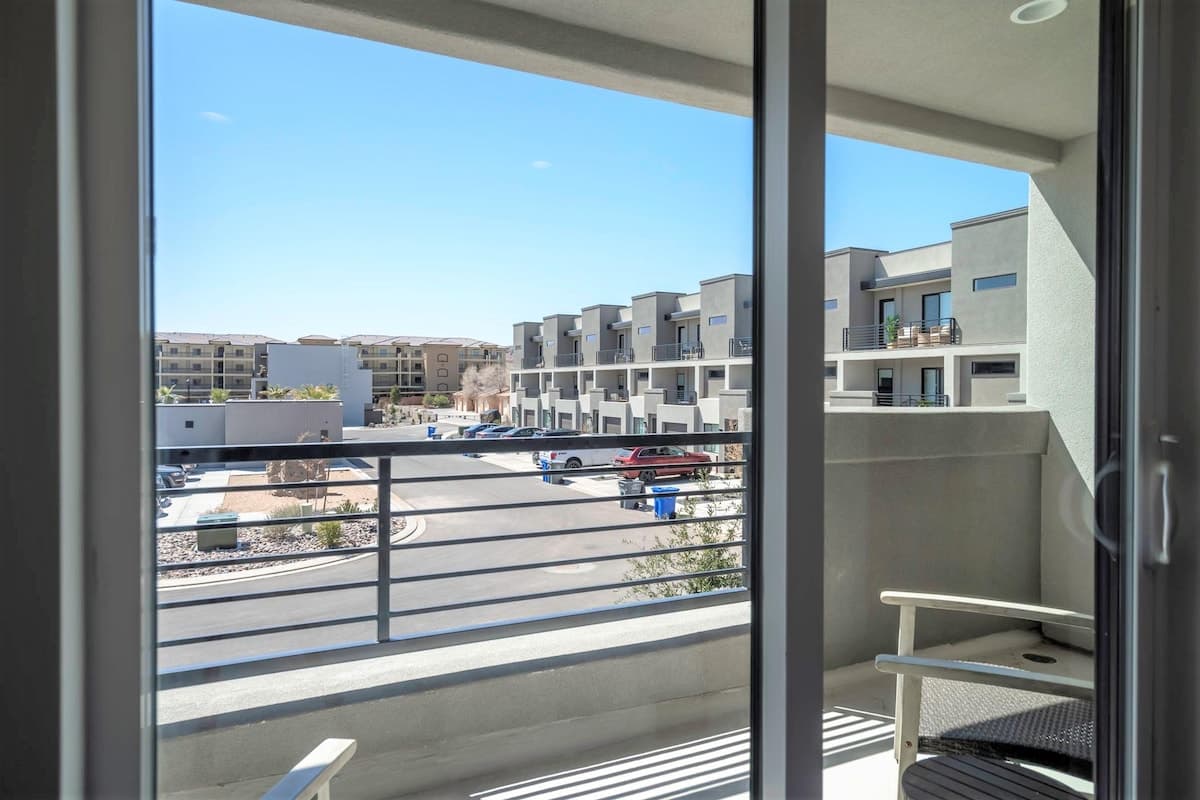Private master balcony on 2nd floor overlooking community pool