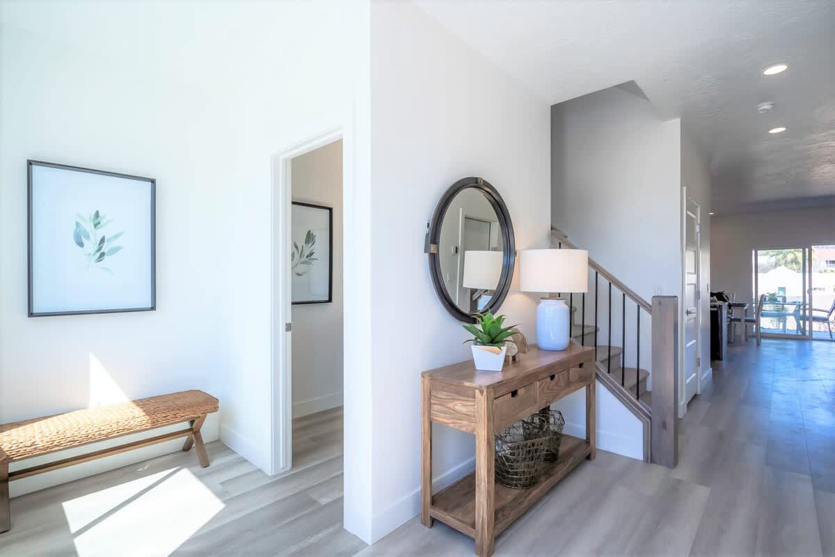 Gorgeous welcoming entry with an airy resort feel