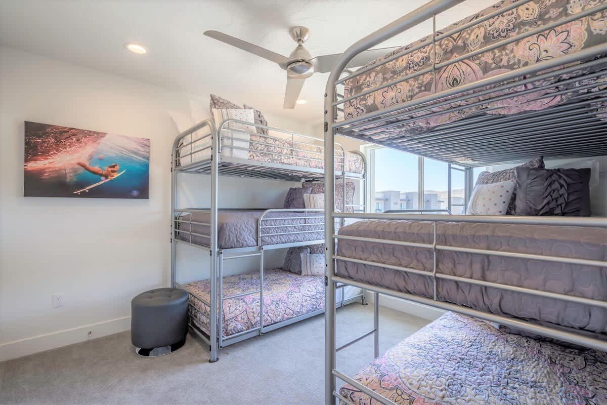 Bedroom 5 on 3rd floor with 2 triple decker twin bunks sleep 6