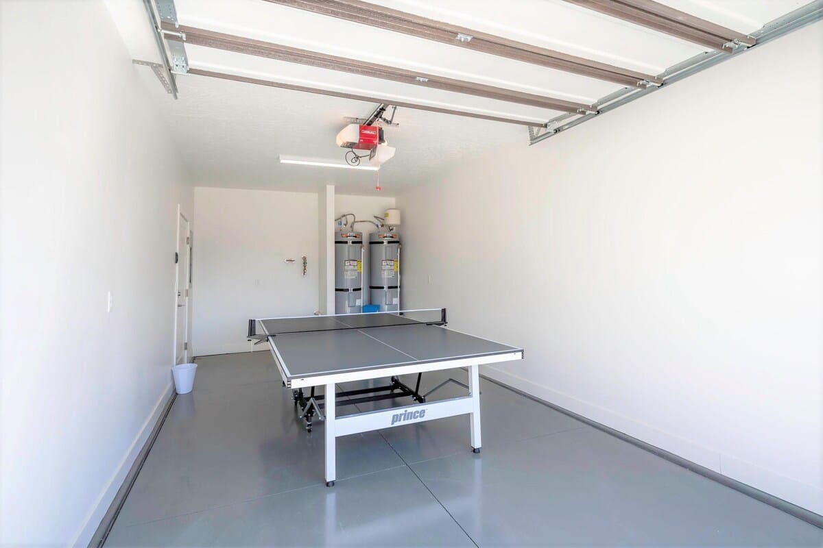 Enjoy ping pong in garage that folds up for parking