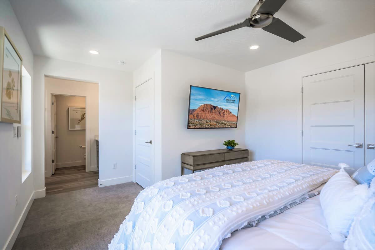 Bedroom 2 on 2nd floor with king bed and TV