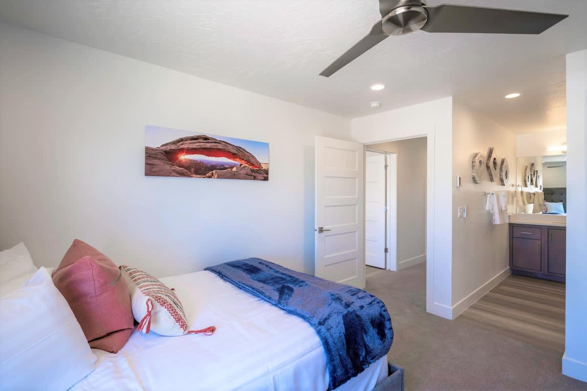 Bedroom 2 on 2nd floor with queen and twin bunk and bathroom