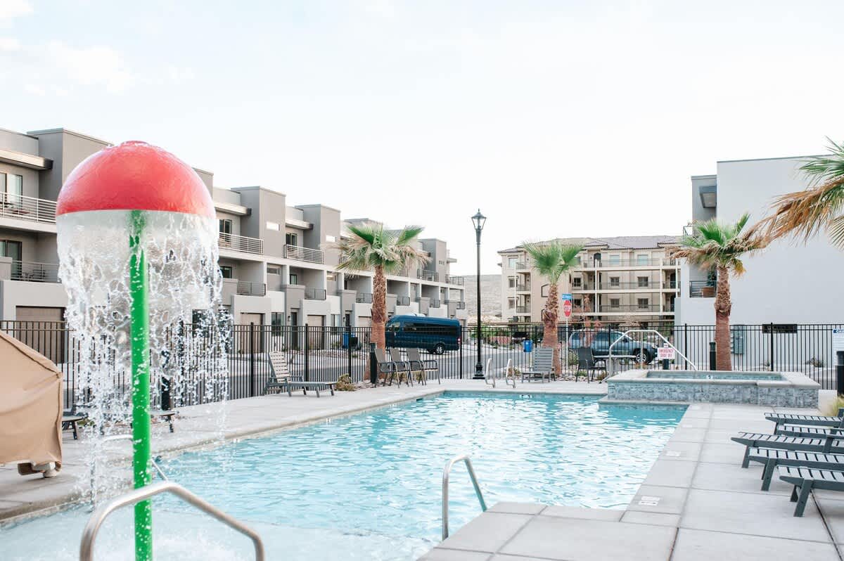 Pool and hot tub with fun splash tower