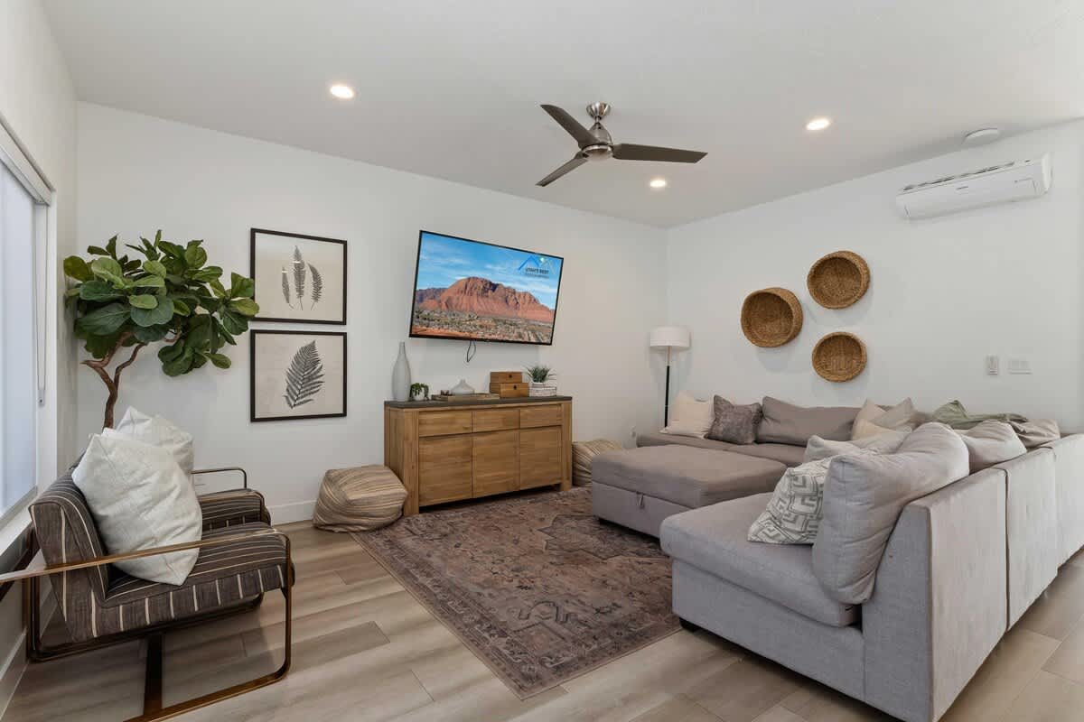 Family room with large TV and sectional