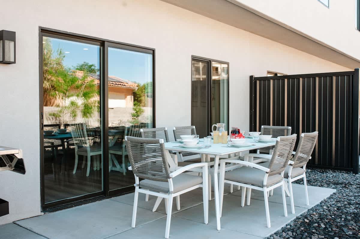 Private back patio with patio dining and barbecue