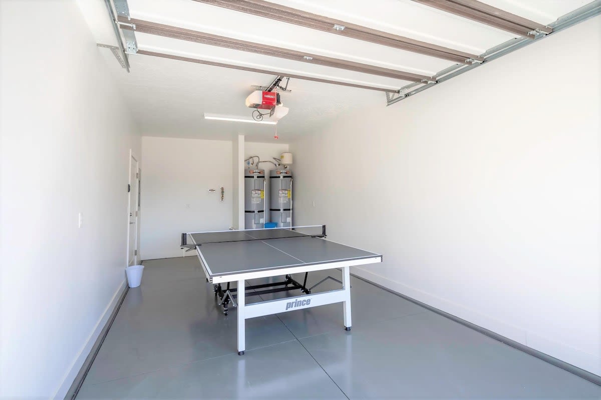 House #19 ping pong table in garage - folds up for parking