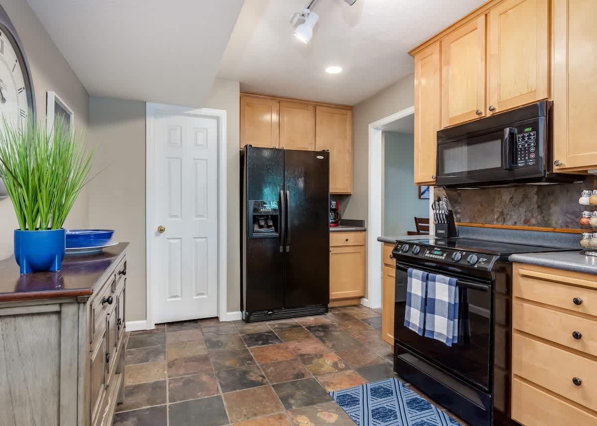Kitchen with slate tile floors