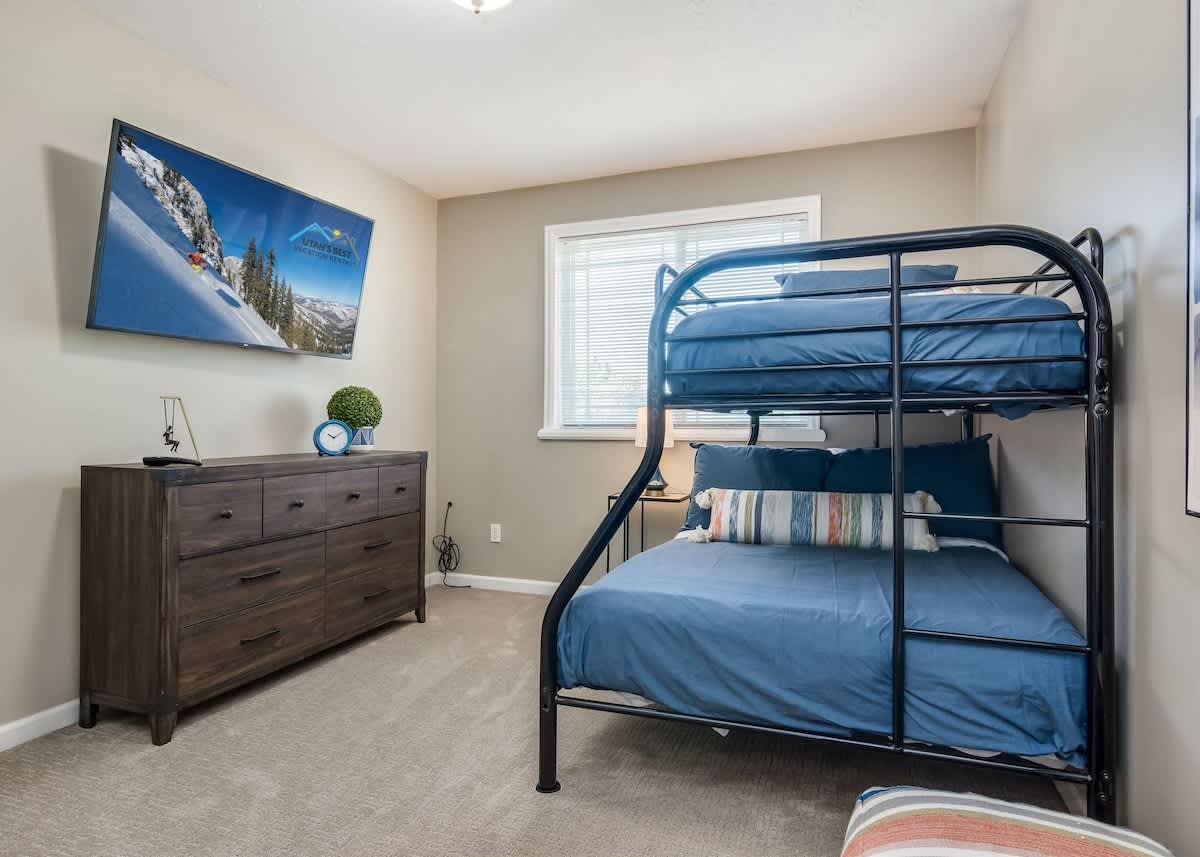 Bedroom 3 with twin over full bunk bed and TV