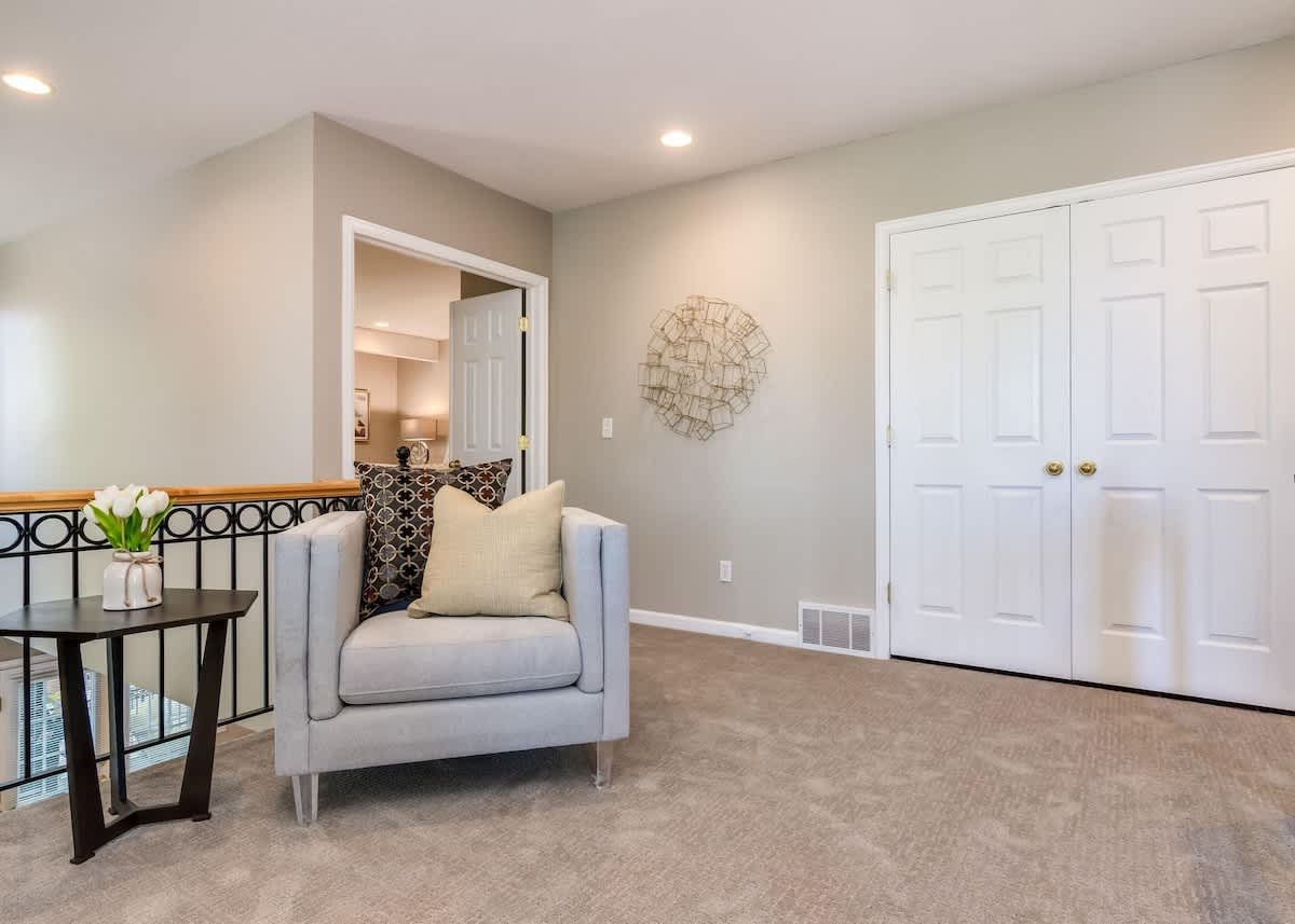 Loft upstairs with nice chair to relax