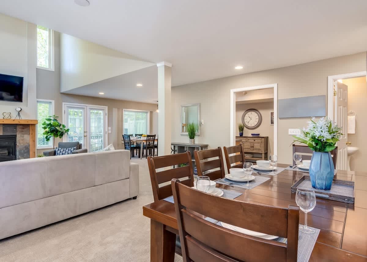 Open concept space with dining area open to family room