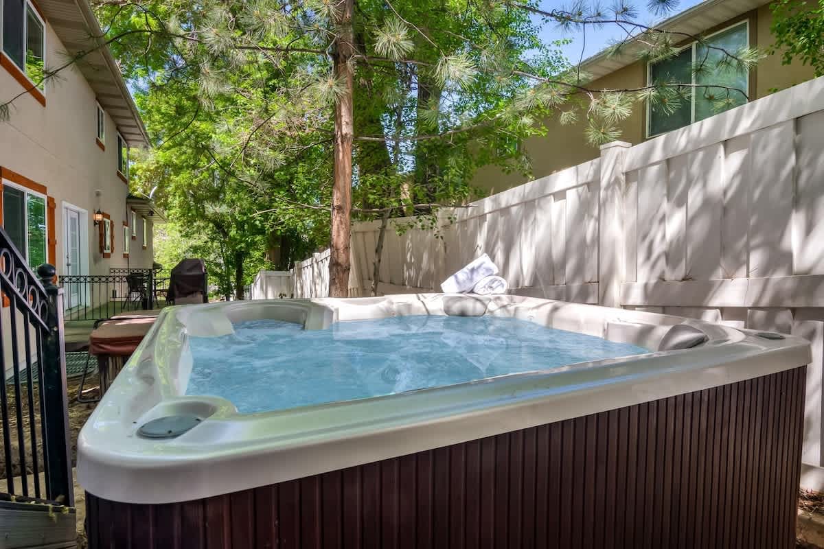 Enjoyable private hot tub on back patio in the trees